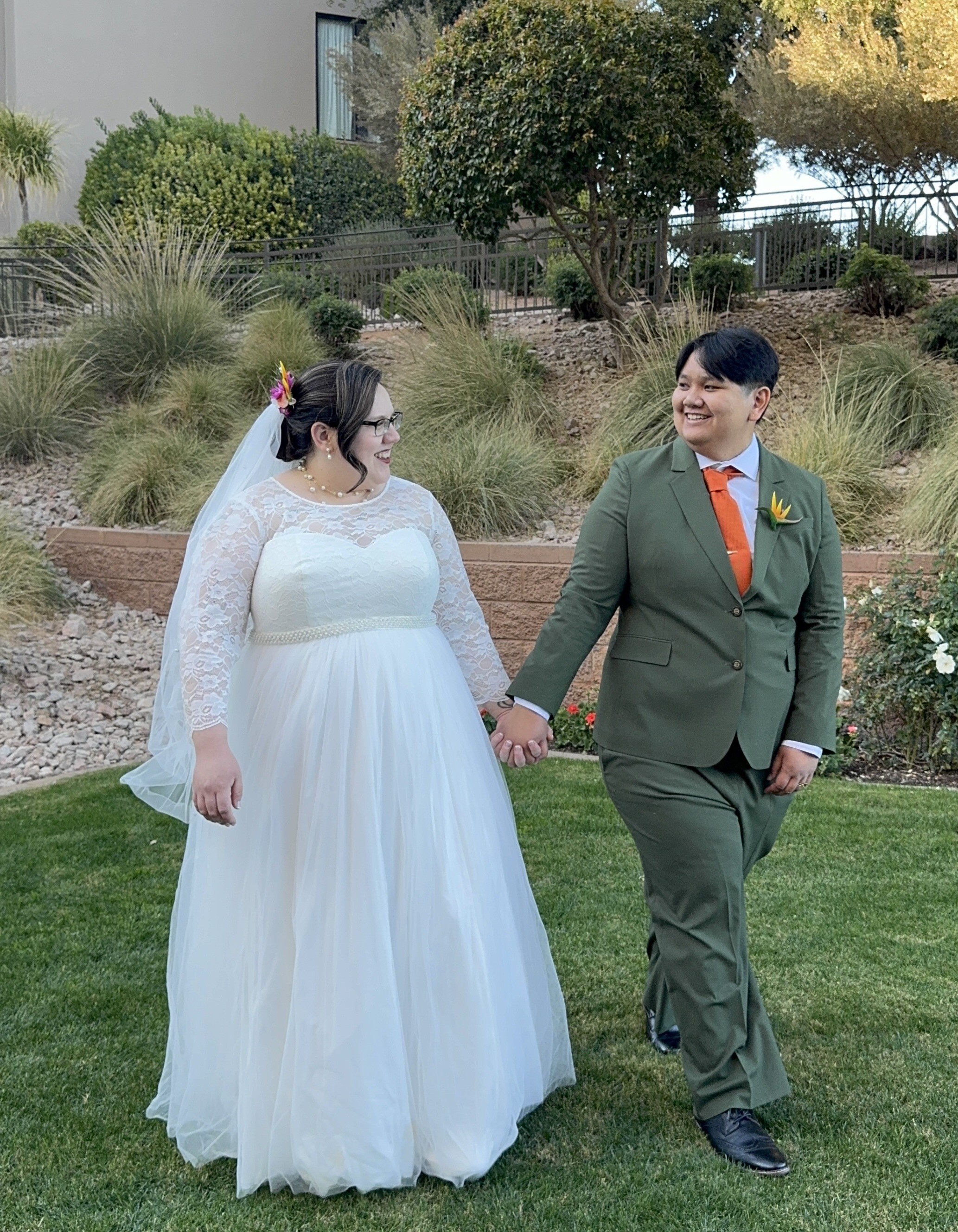 Photo and Shay and Elie at their wedding